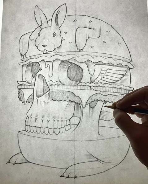 drawing of a bunny with a skull forming a burger
