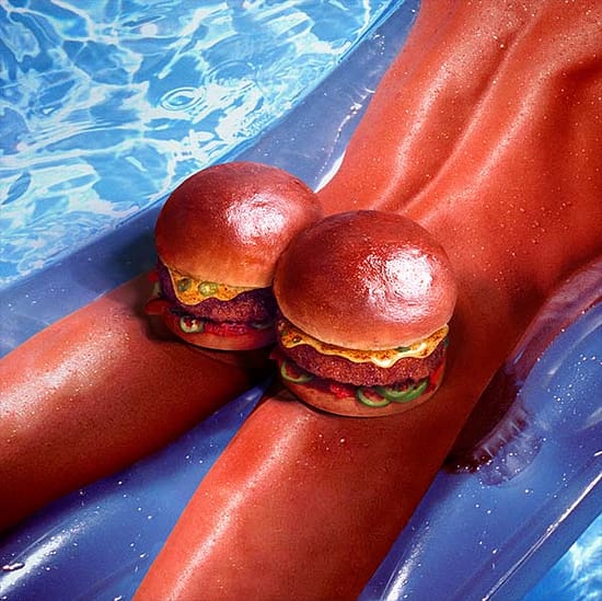 person with two burger on buttcheeks sunbathing